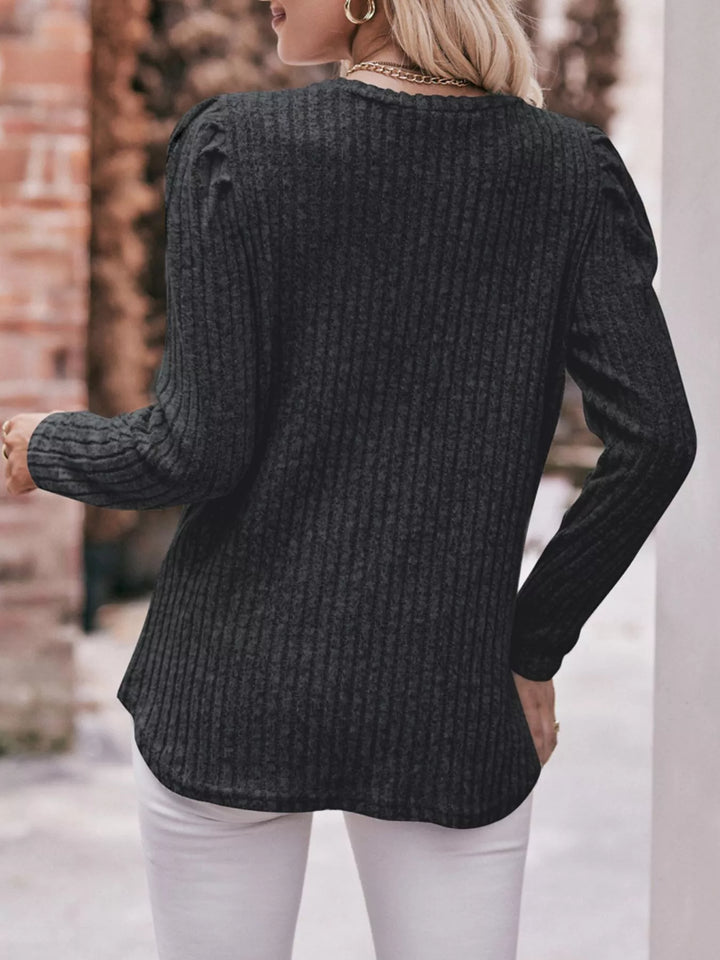 Ribbed knit long sleeve top with puff shoulders