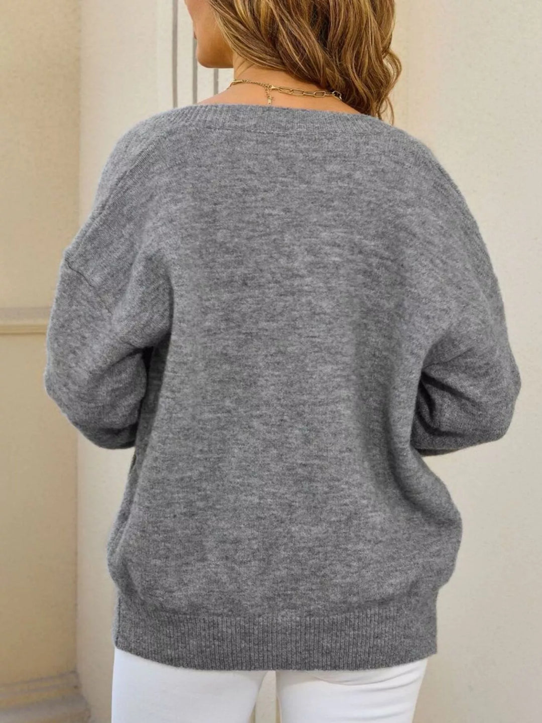 Button-down knit cardigan with front pockets and ribbed trim