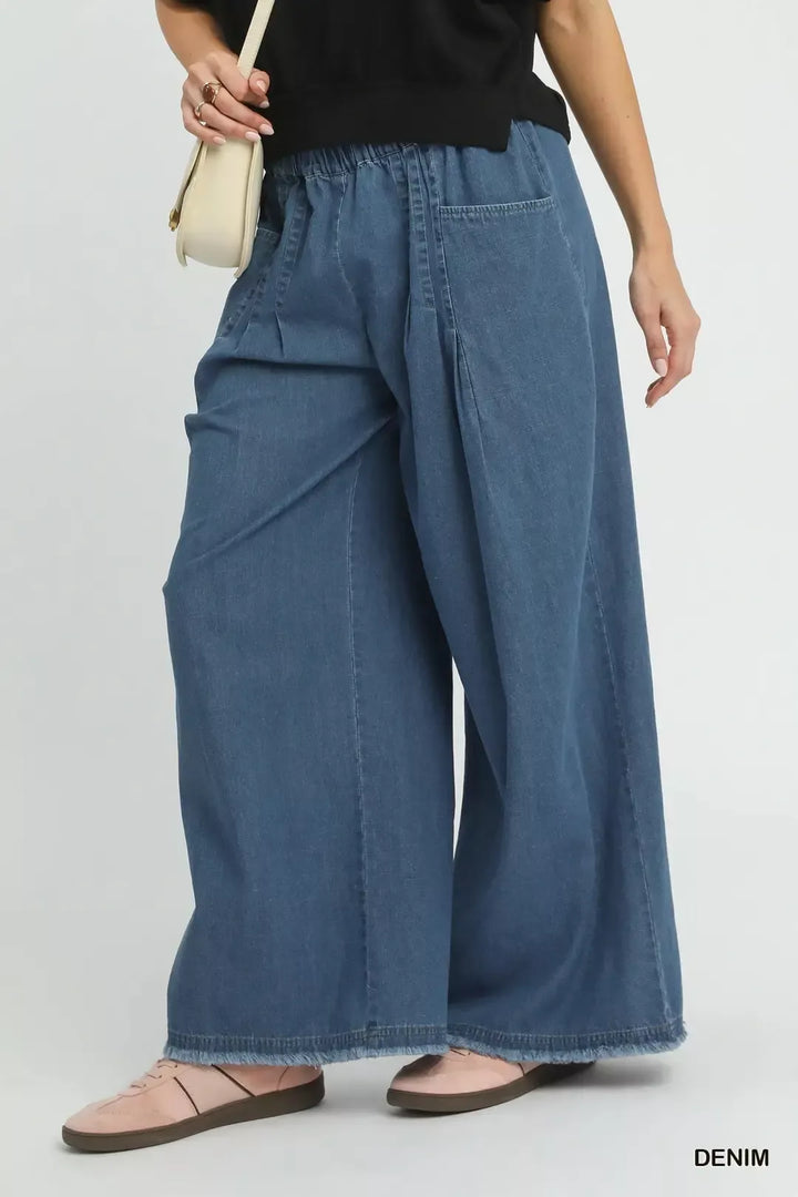 Stone washed wide leg cotton pants with raw hem