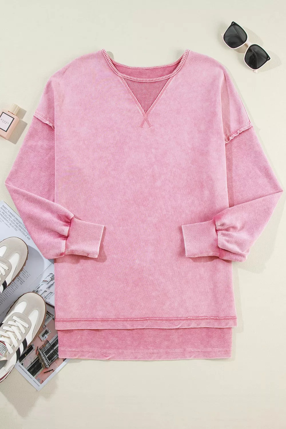Vintage wash oversized sweatshirt with exposed seams and side slits