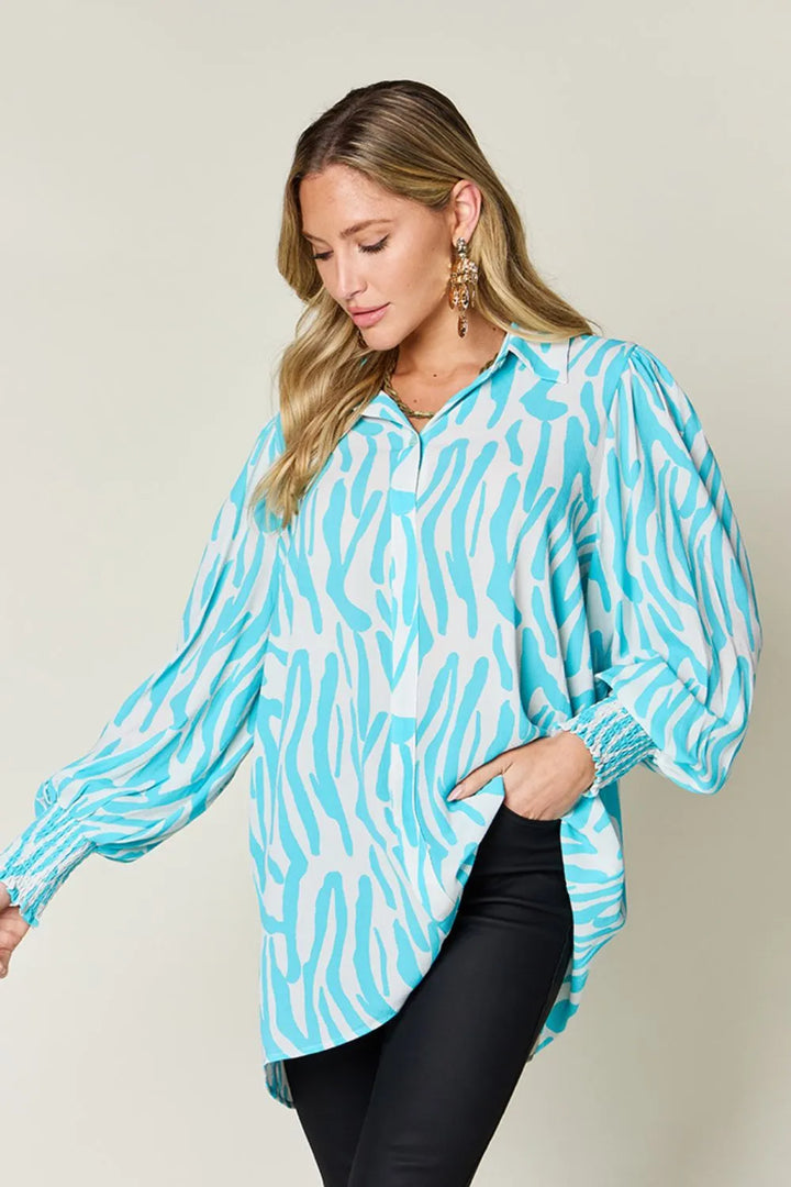 Zebra print smocked-cuff long sleeve blouse