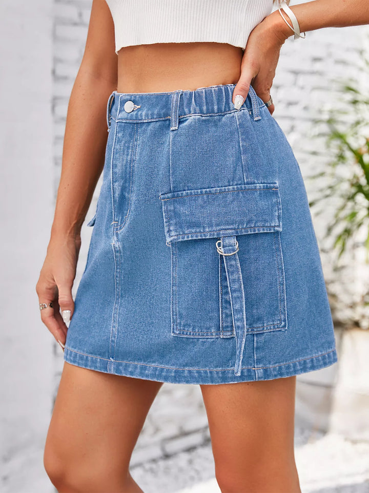 Cargo denim mini skirt with flap pockets and D-rings