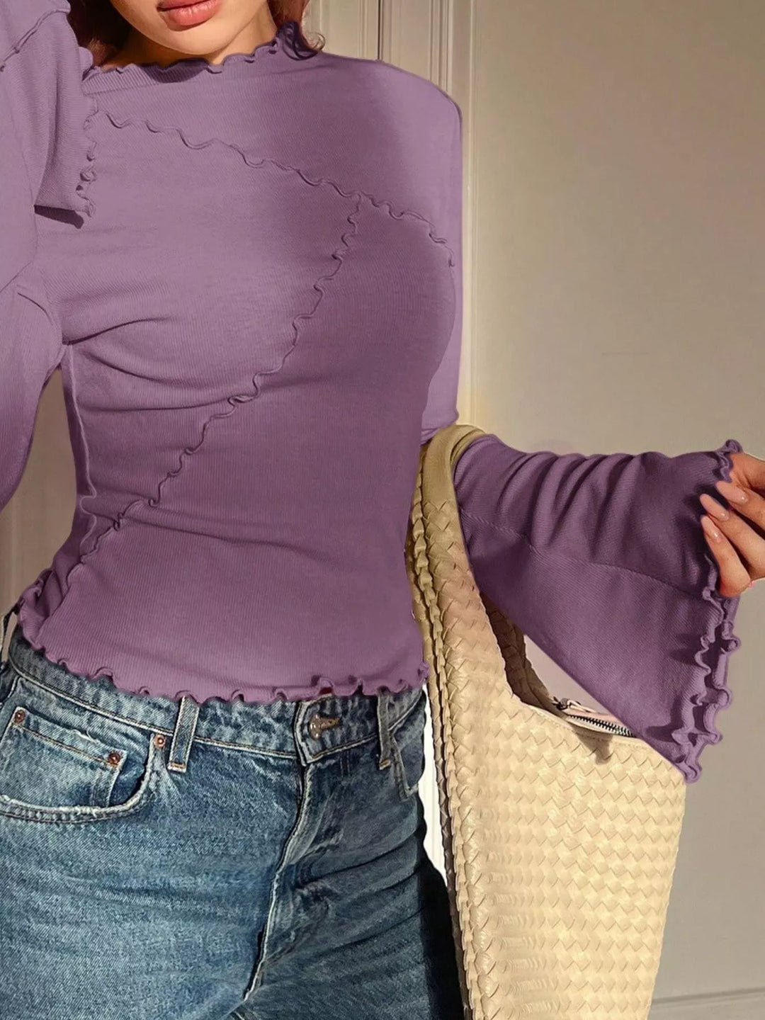 Ribbed knit mock neck top with lettuce-edge flare sleeves