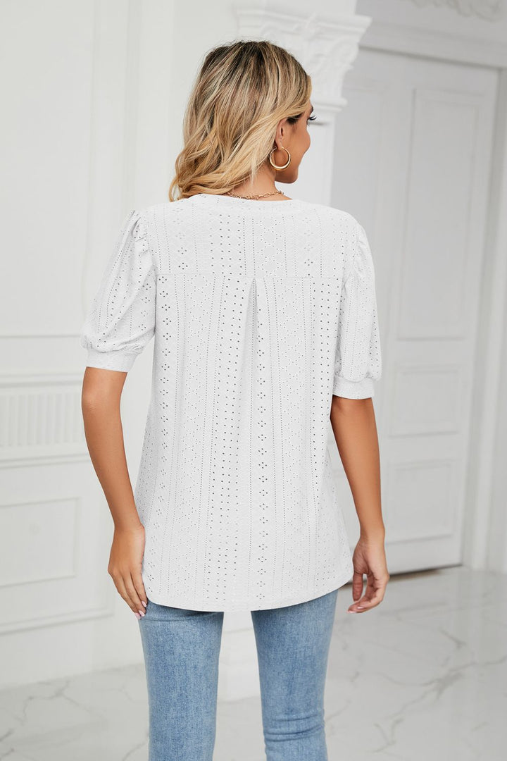 Eyelet puff sleeve top with notched V-neck