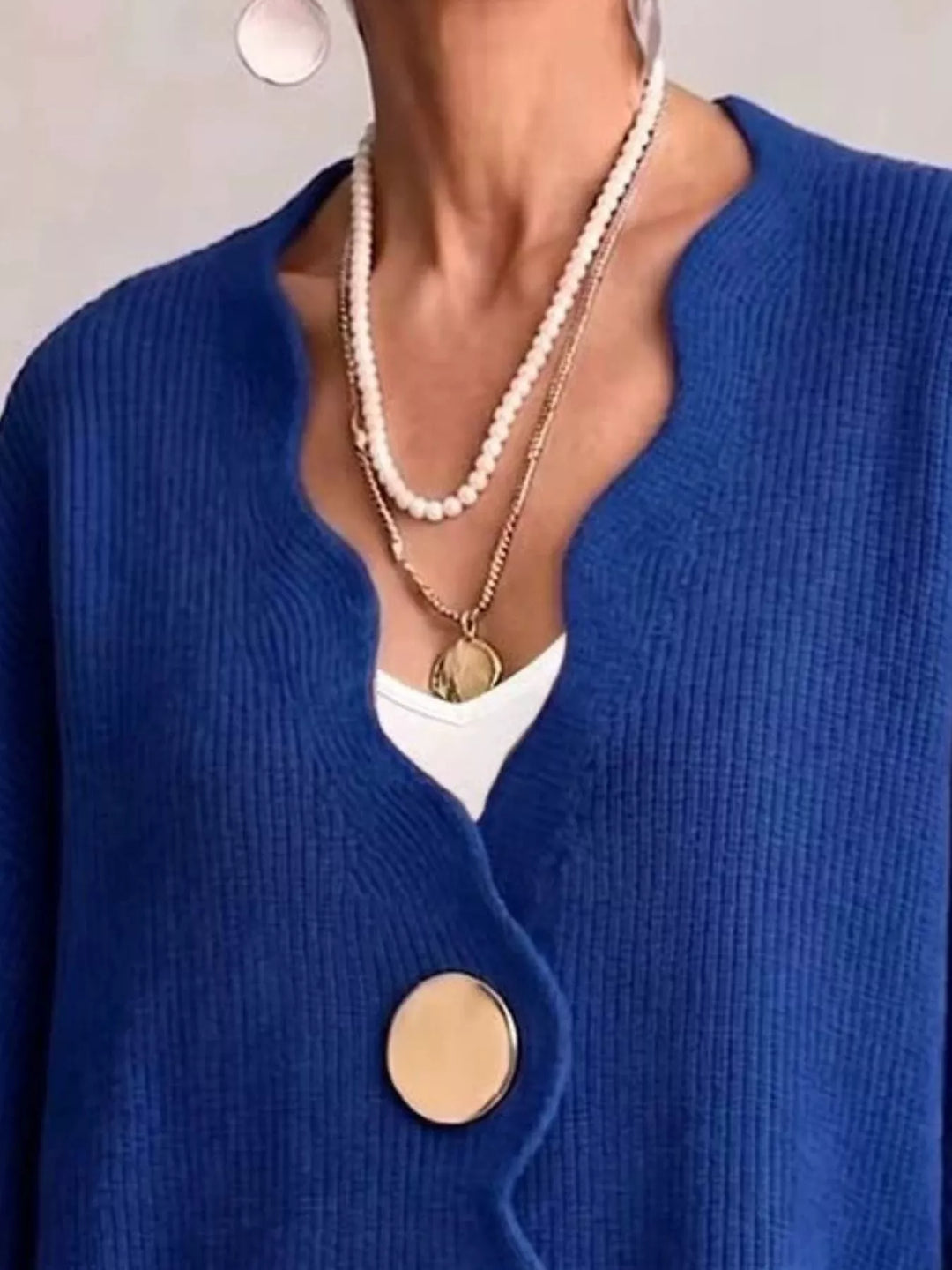 Scalloped-edge ribbed knit oversized button-down cardigan
