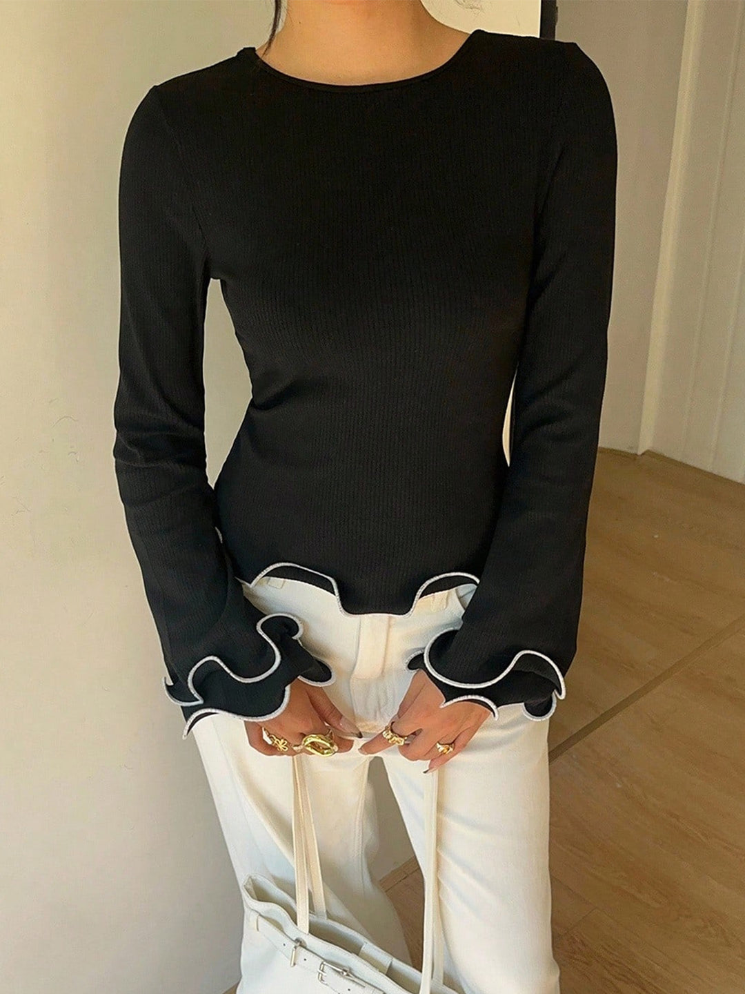 Black Ribbed lettuce-hem long sleeve top with tie back