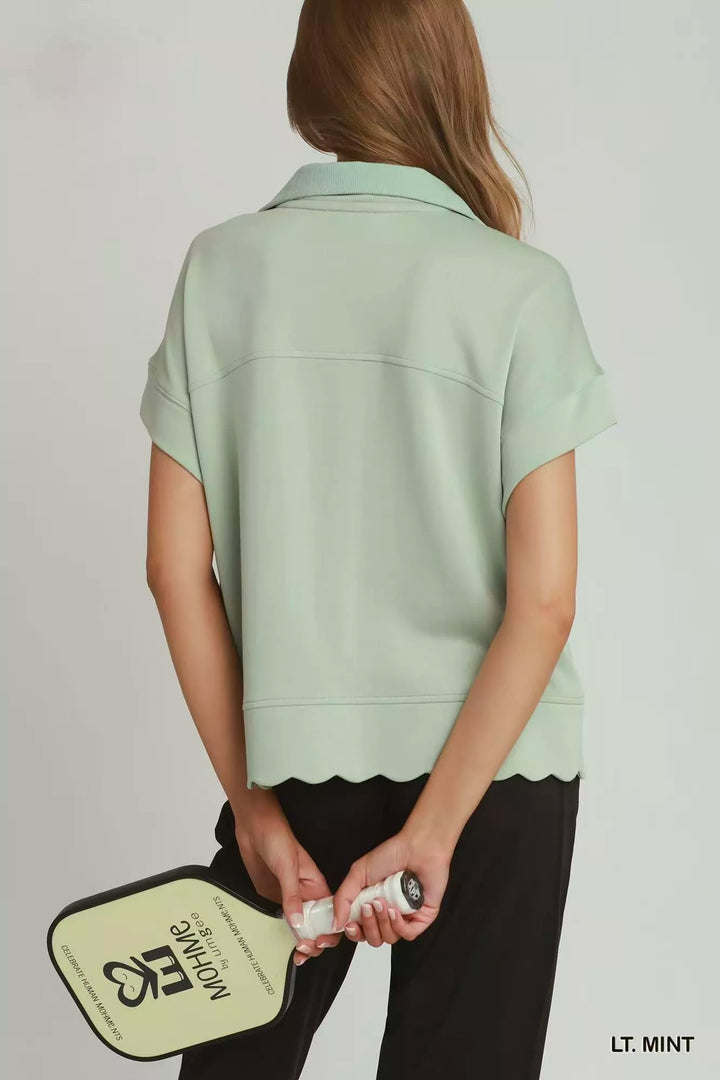 Scalloped hem half-zip short-sleeve pullover