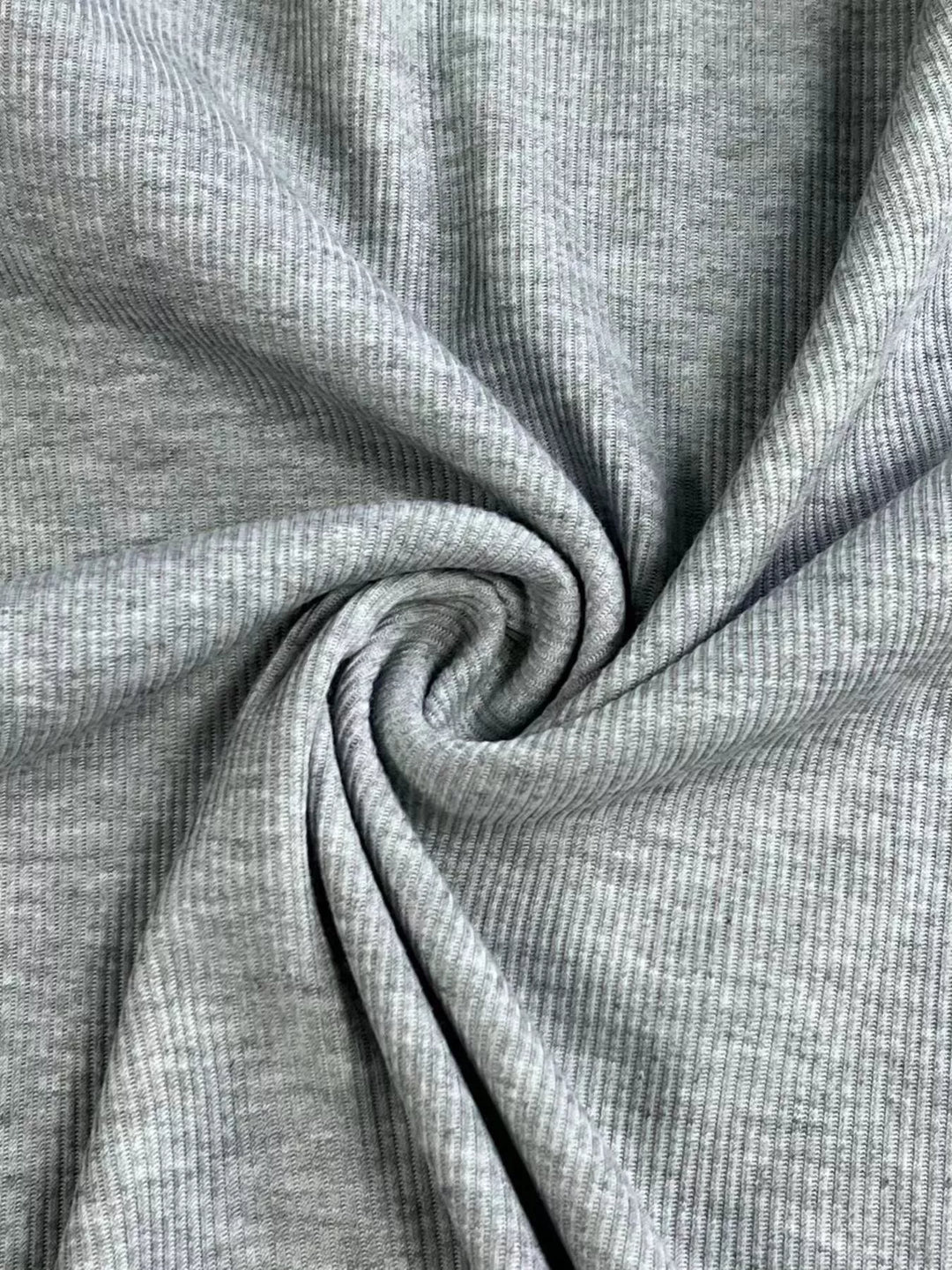 Ribbed knit top with ruffled cap sleeves