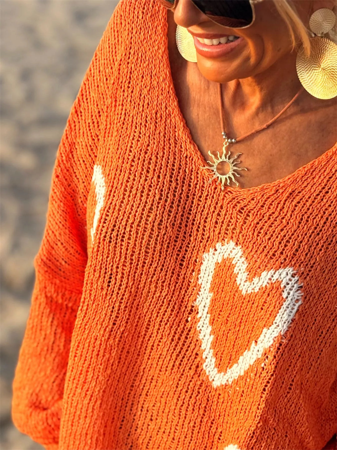 Heart motif V-neck dropped-shoulder knit sweater