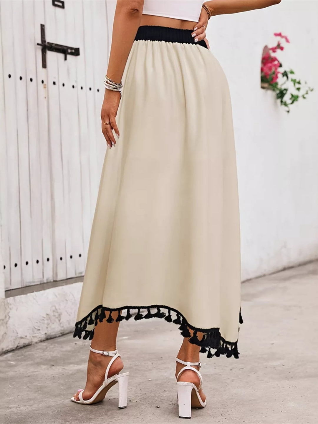 Contrast stripe high-waist midi skirt with tassel hem