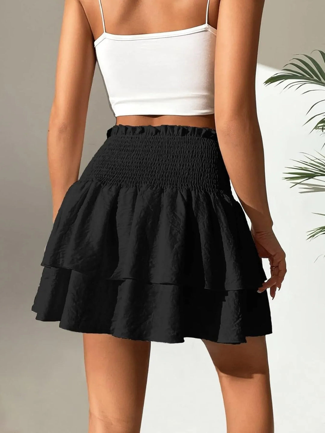 Black High-waist smocked tiered ruffle mini skirt