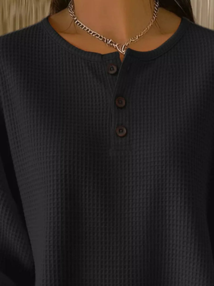Waffle knit henley top with button placket and long sleeves