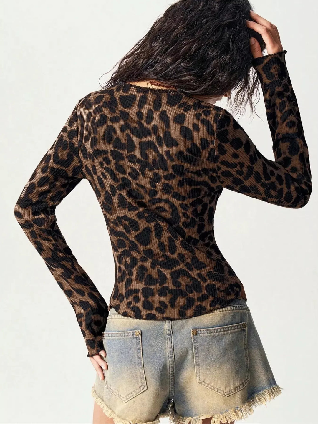 Ribbed leopard print button-up top with long sleeves