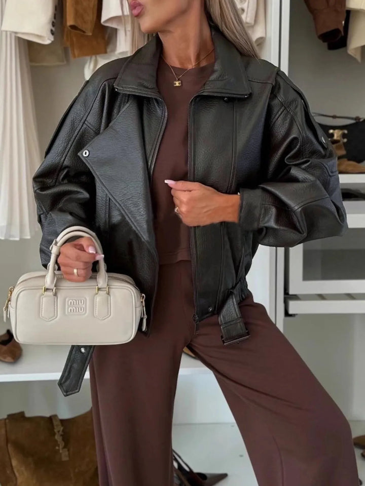 Oversized faux leather moto jacket with belted hem