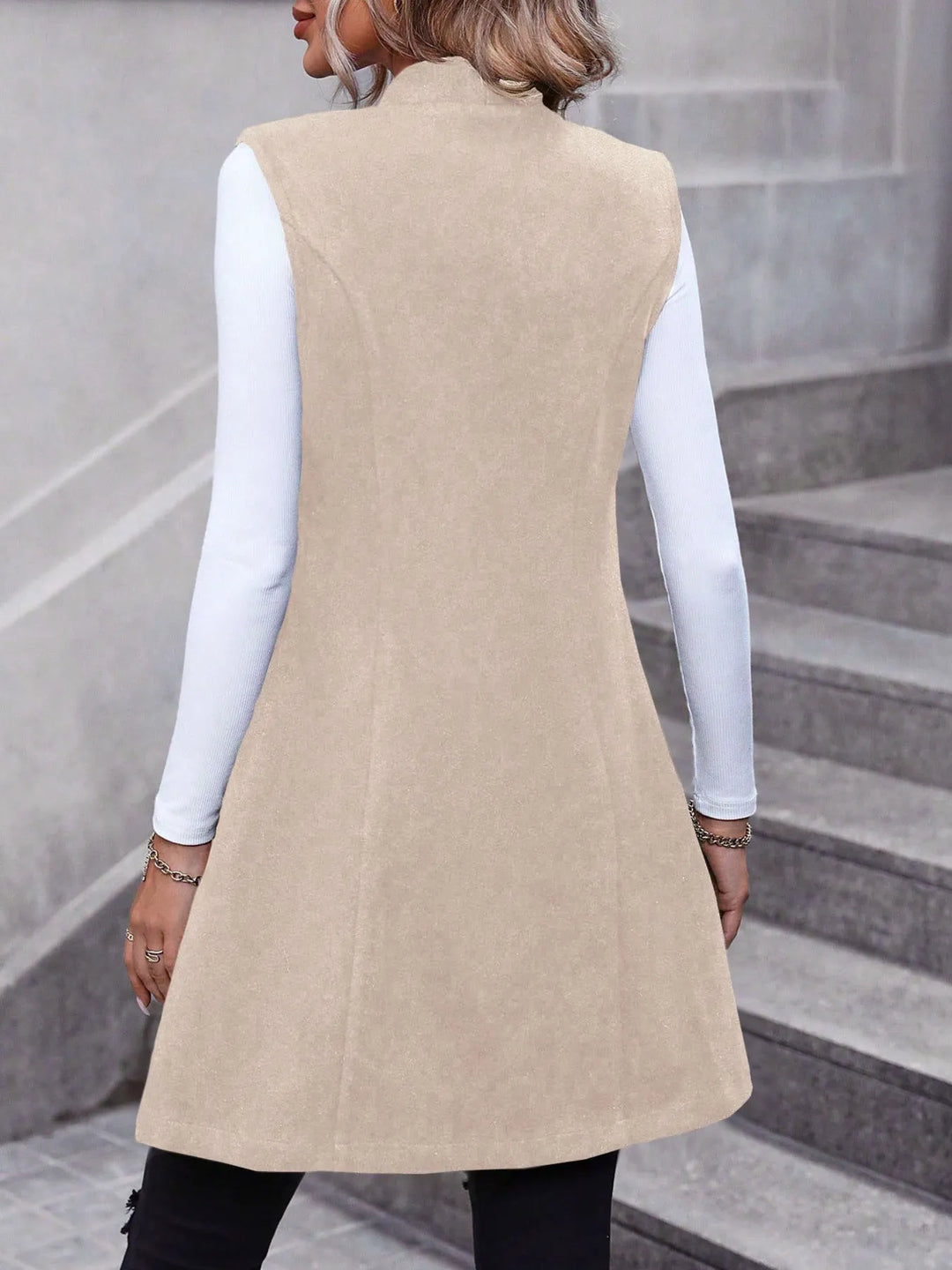 Longline sleeveless vest coat with button front