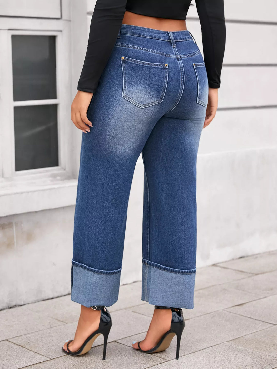 Plus size high-rise wide-leg jeans with deep cuffed hem