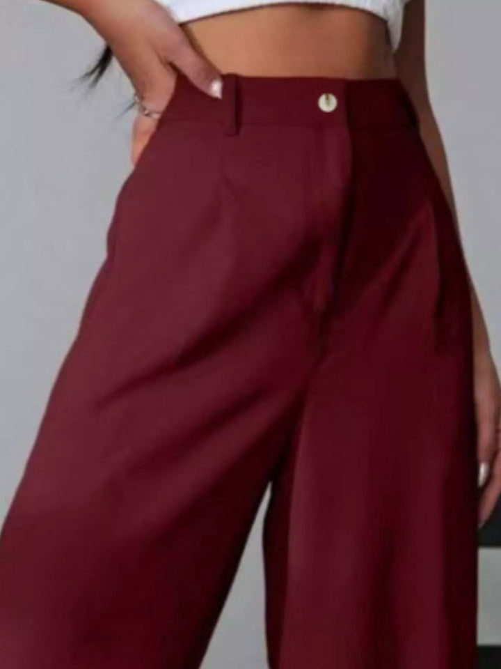 High-rise wide-leg pleated pants with button waist
