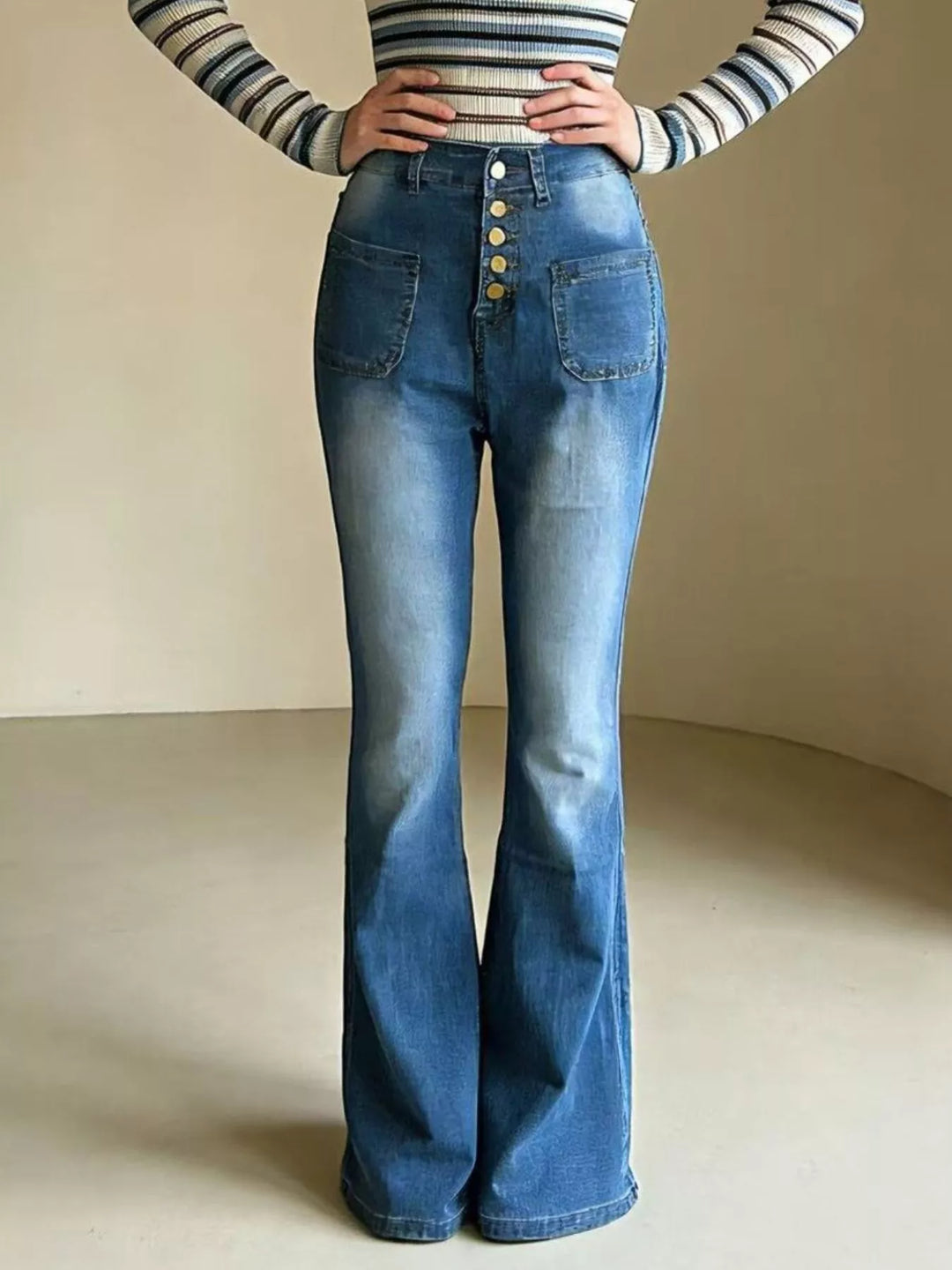 High-waisted button-fly flare jeans with patch pockets