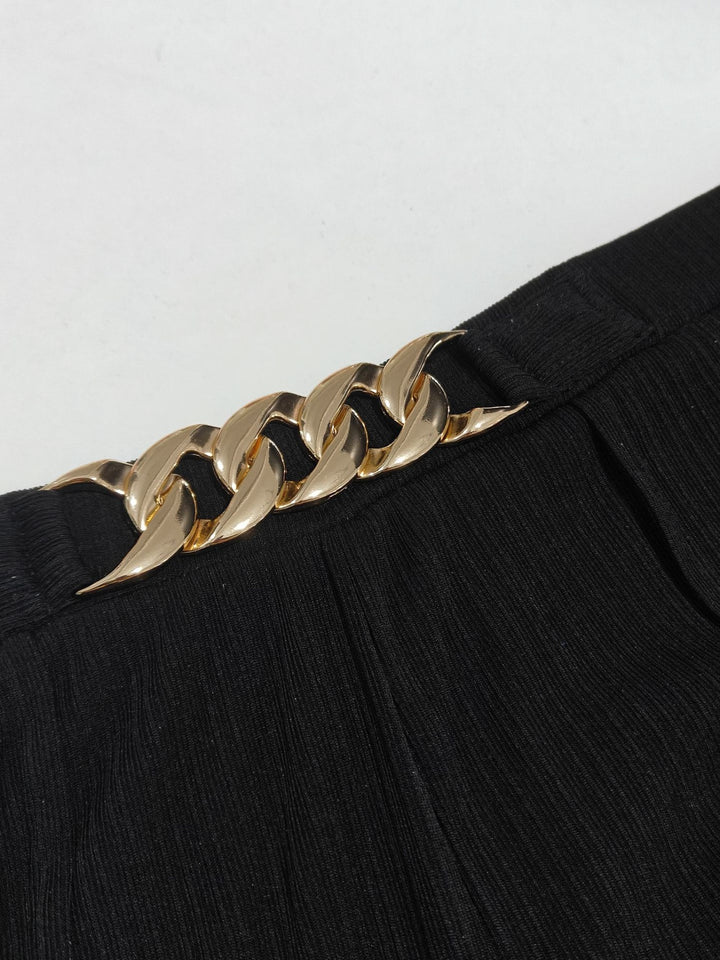Plus size high-rise wide-leg pants with gold chain waist