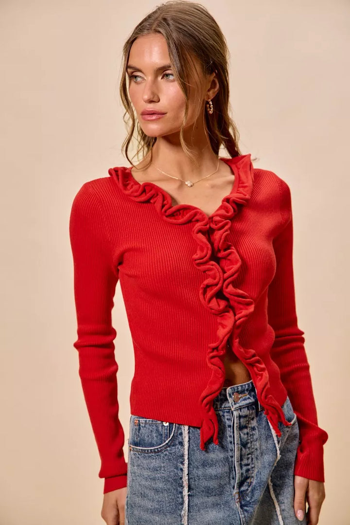 Ribbed knit cardigan with cascade ruffle trim