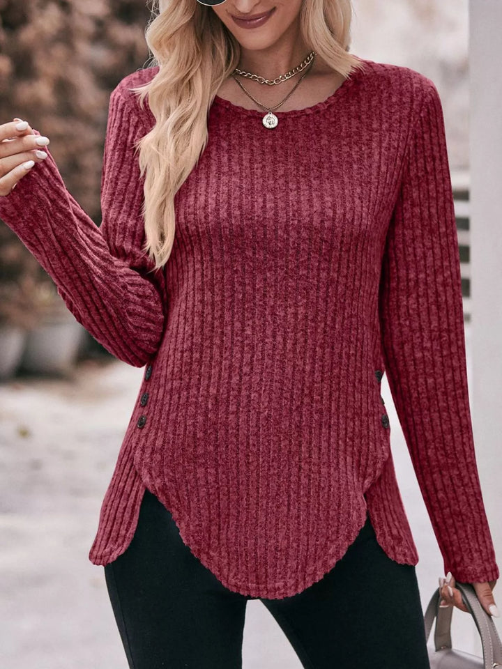 Ribbed knit long sleeve top with side button hem