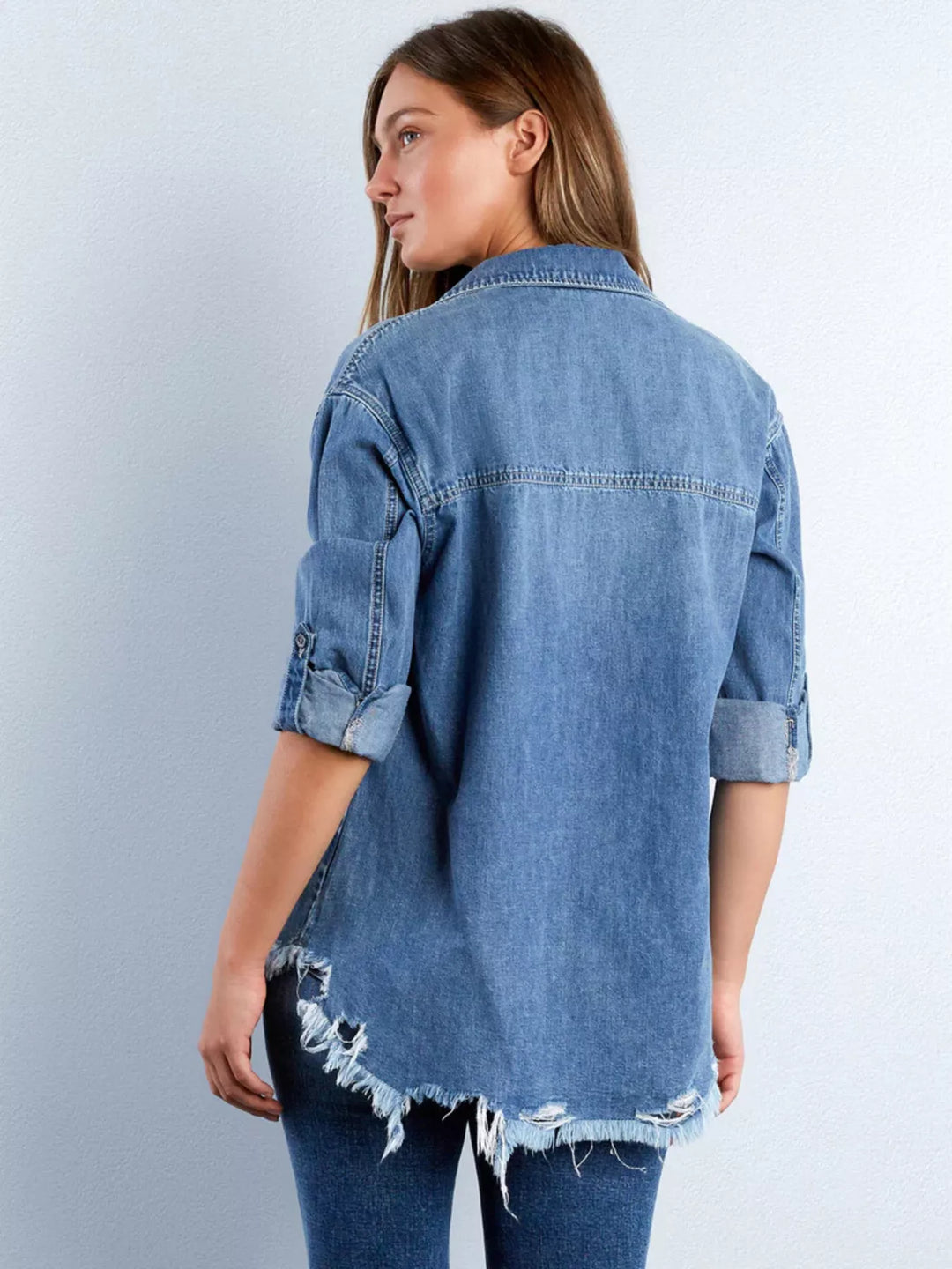 Oversized denim shirt with heart pocket and frayed hem