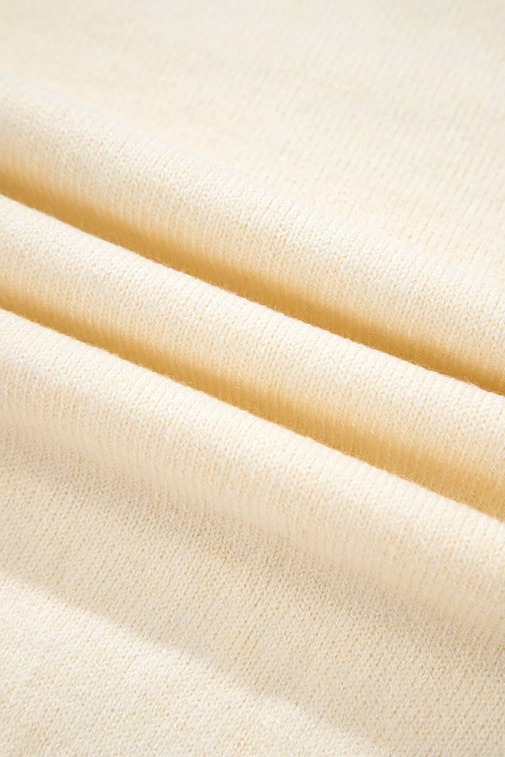 Button-cuff raglan sleeve crew neck sweater