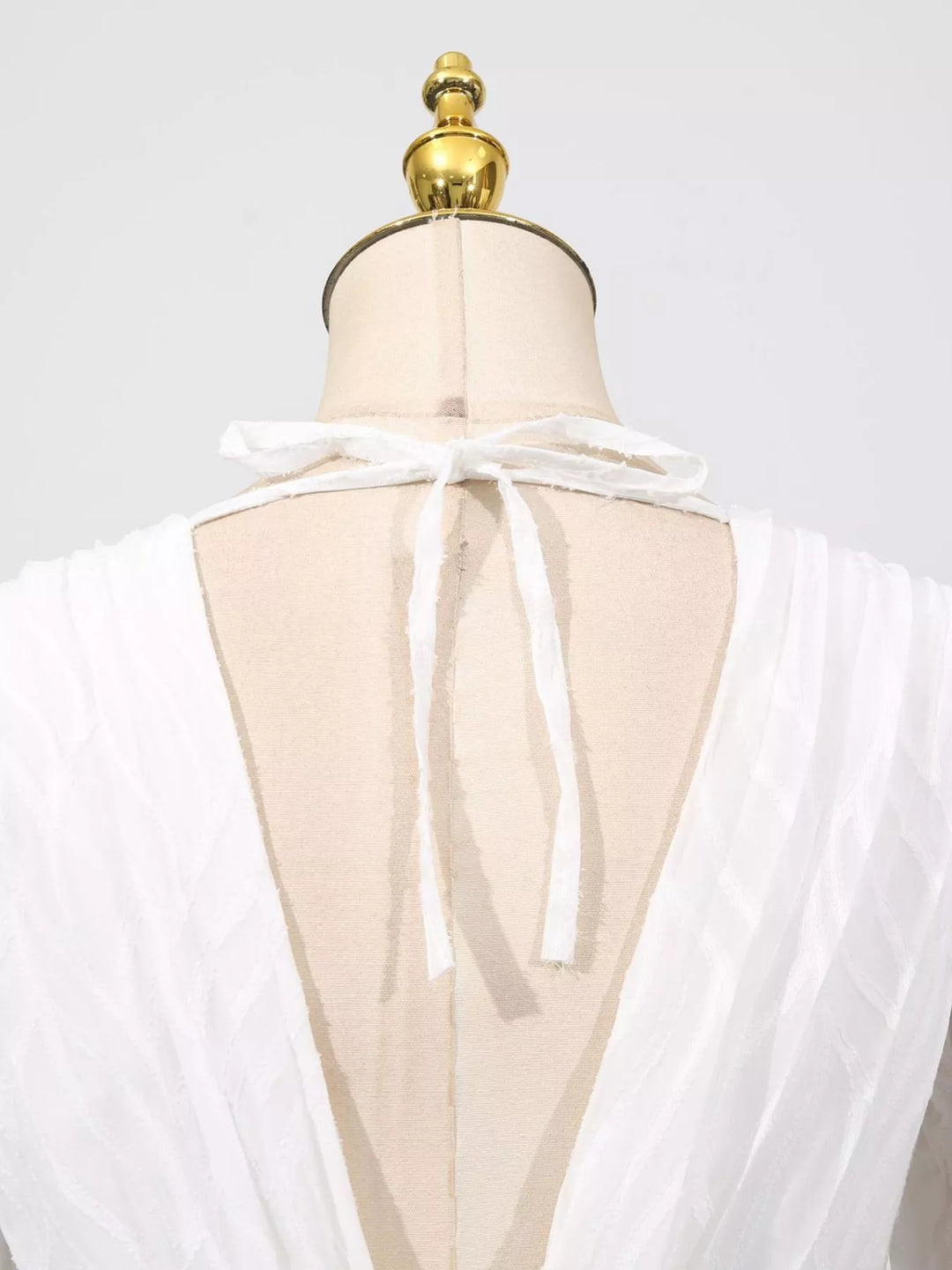 Textured V-neck balloon sleeve maxi dress with twist front