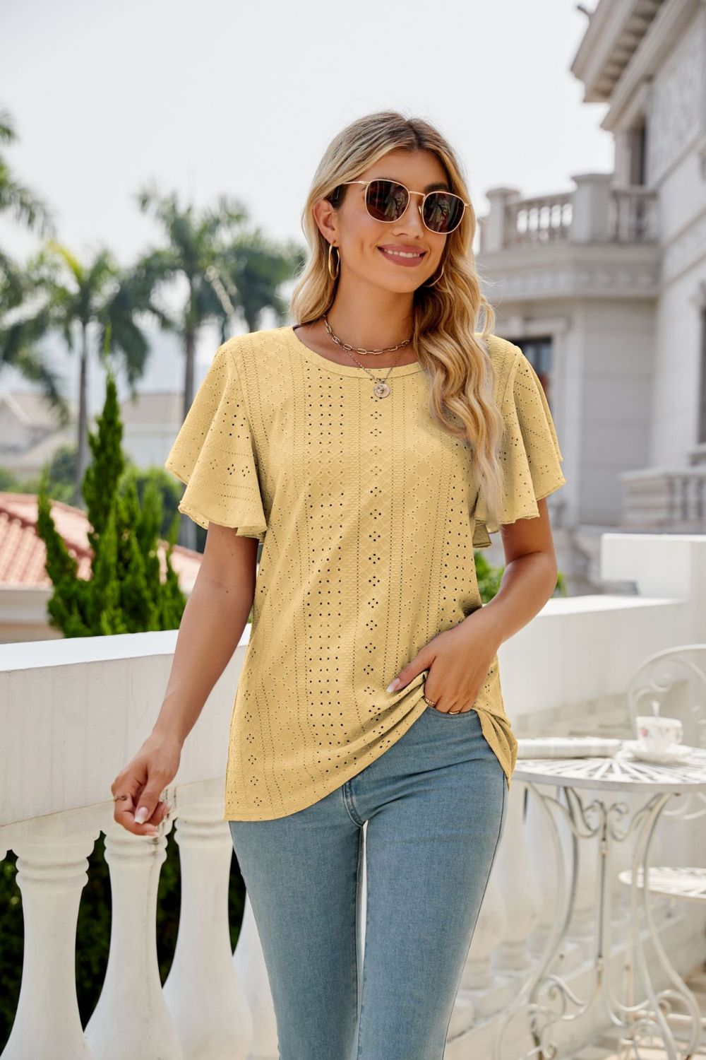 Eyelet knit flutter sleeve round neck top