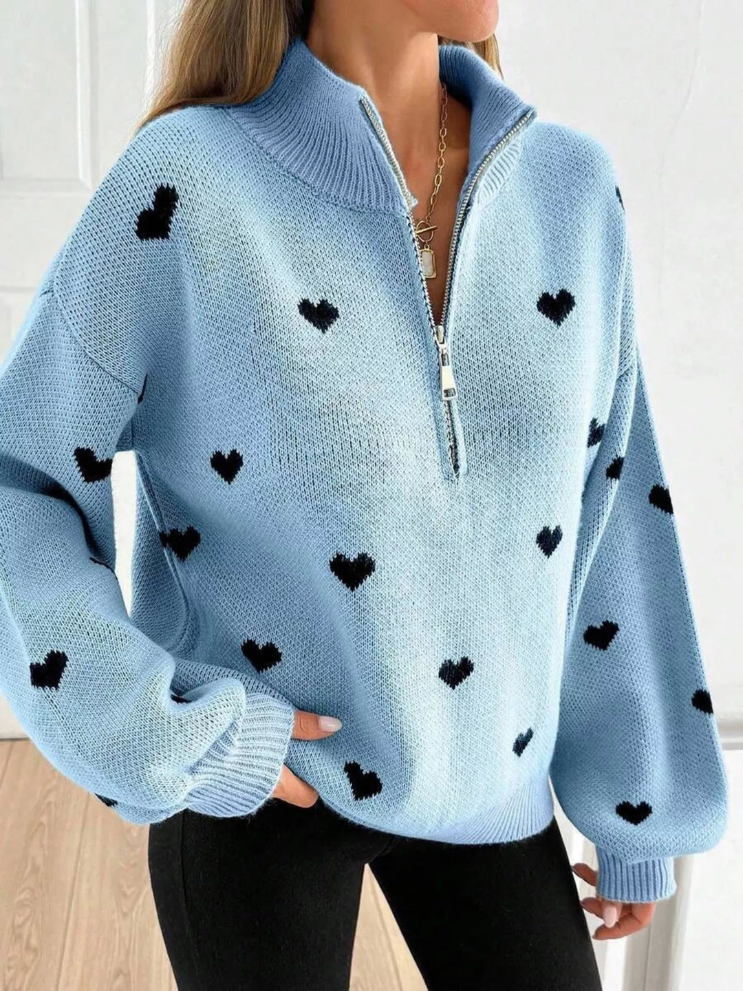 Sky Blue Heart print half-zip mock neck sweater with drop shoulders