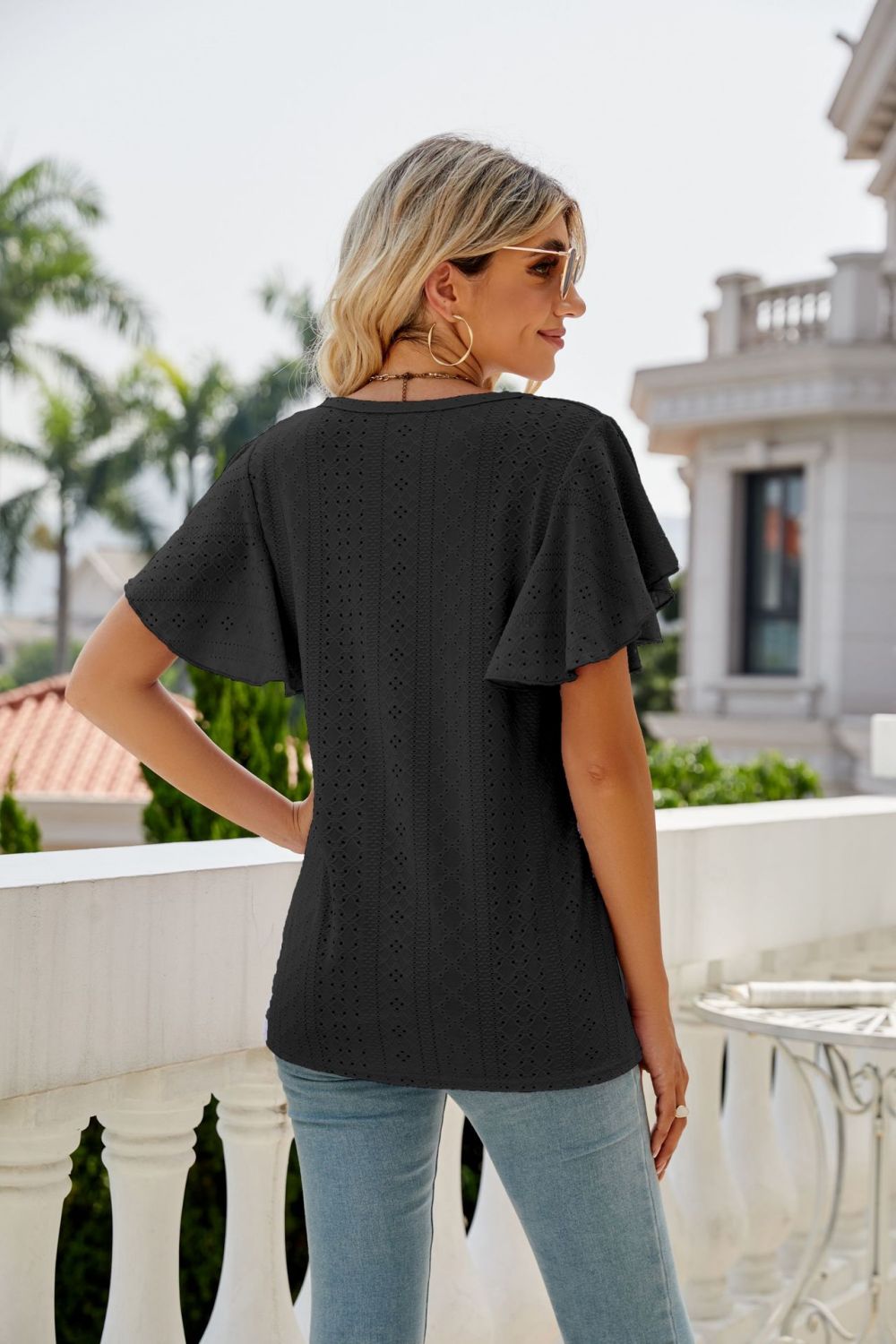 Eyelet knit flutter sleeve round neck top