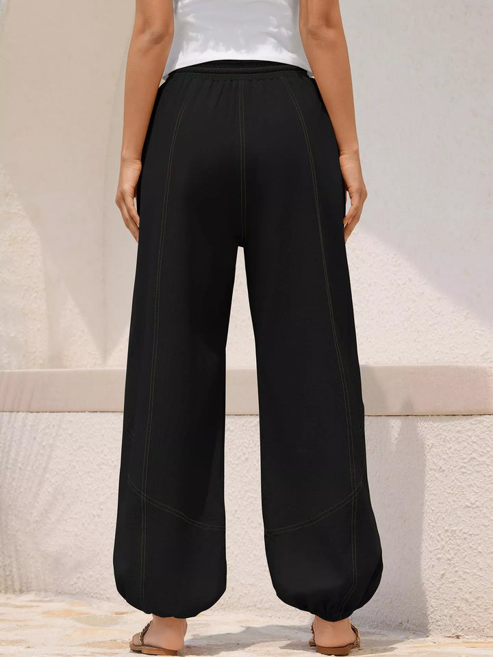 Drawstring waist wide-leg harem joggers with side pockets