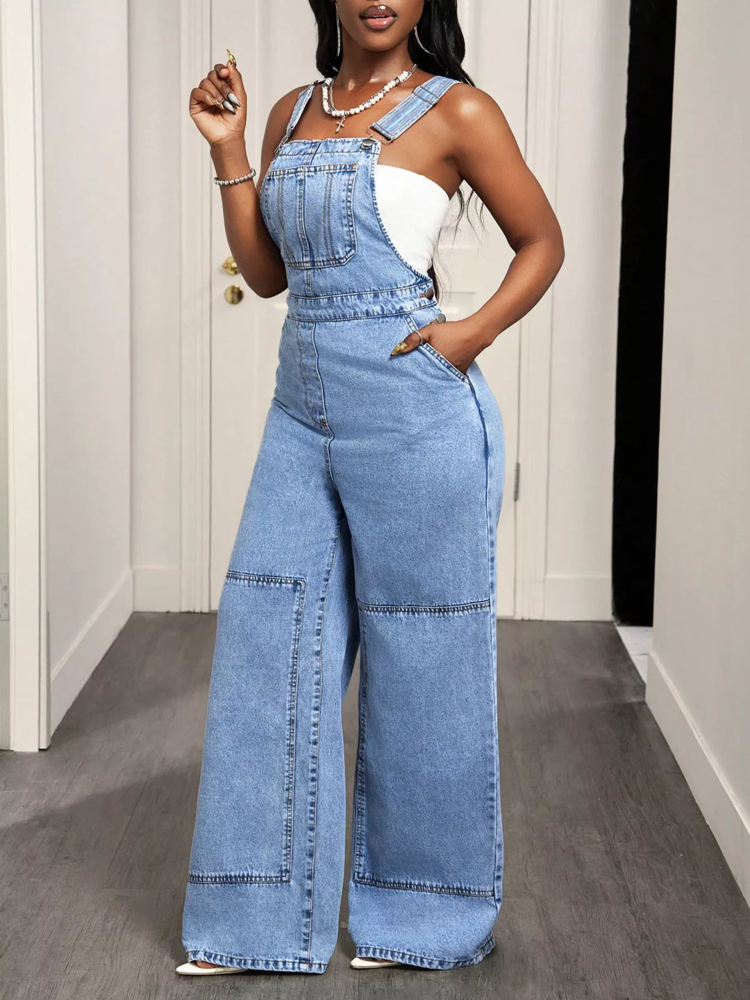 Wide leg denim overalls with bib pocket and side buttons