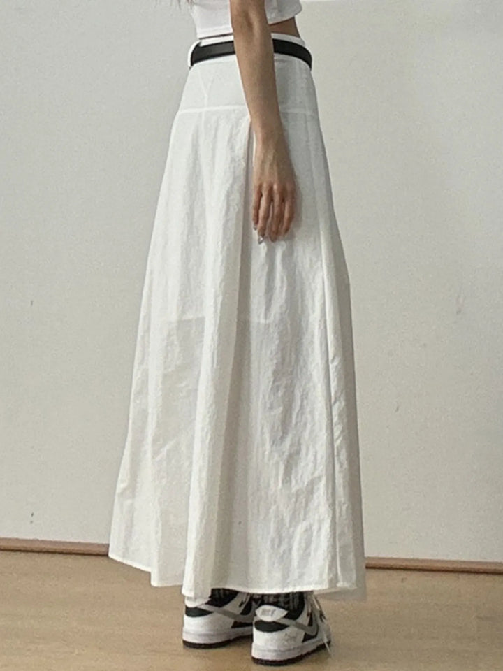 High-rise A-line maxi skirt with front pleats