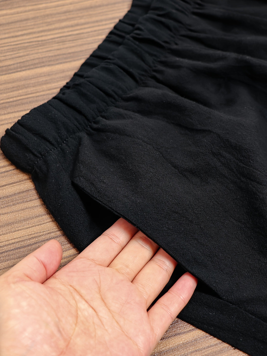 Elastic-waist wide-leg pants with tulip hem and pockets