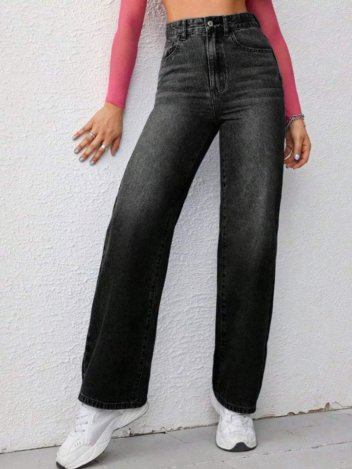 High-rise wide-leg washed jeans with whiskering