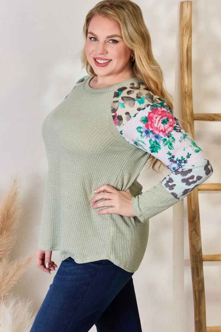 Waffle knit top with floral and leopard print sleeves