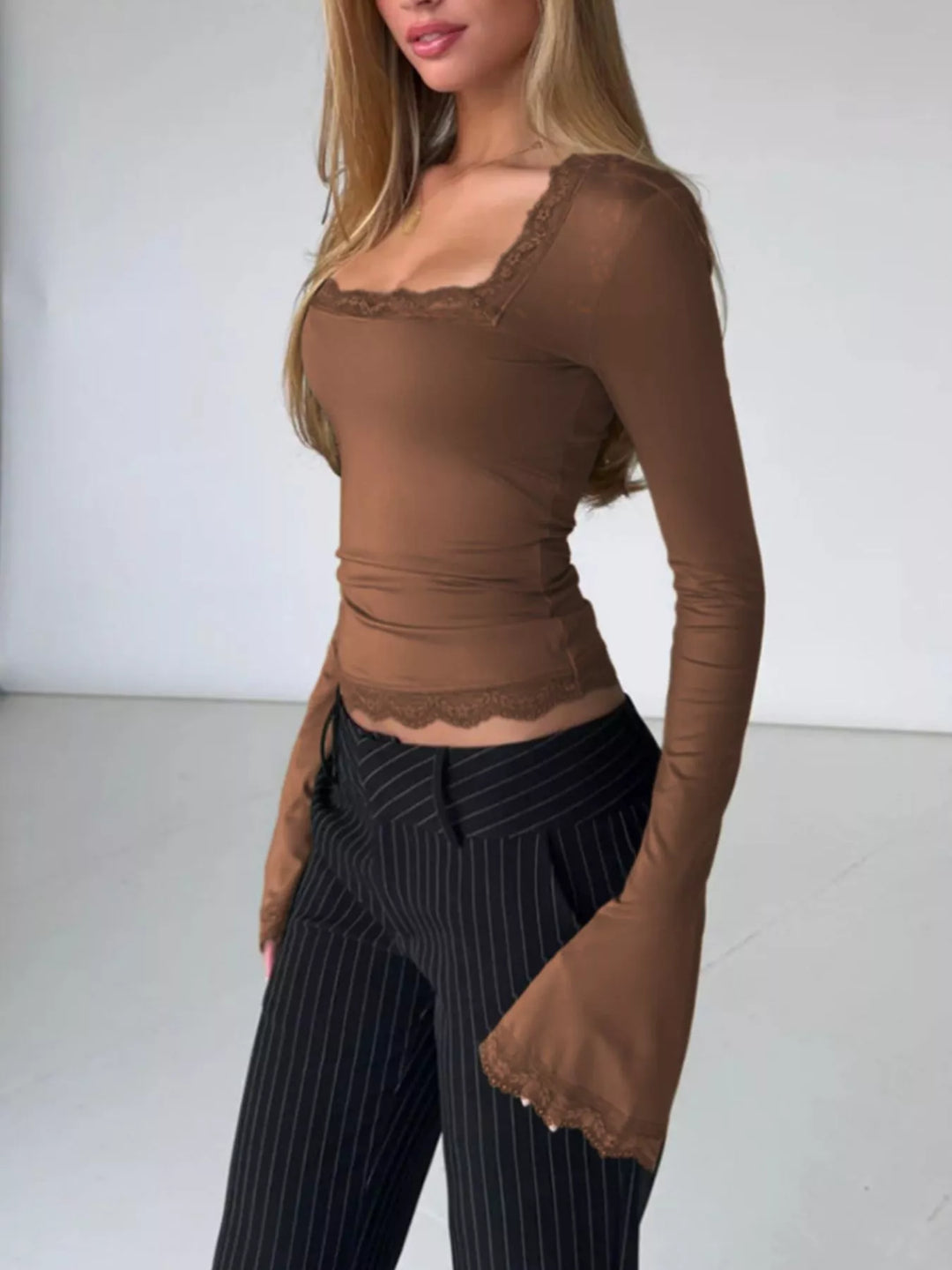 Lace trim long sleeve top with square neck and bell cuffs