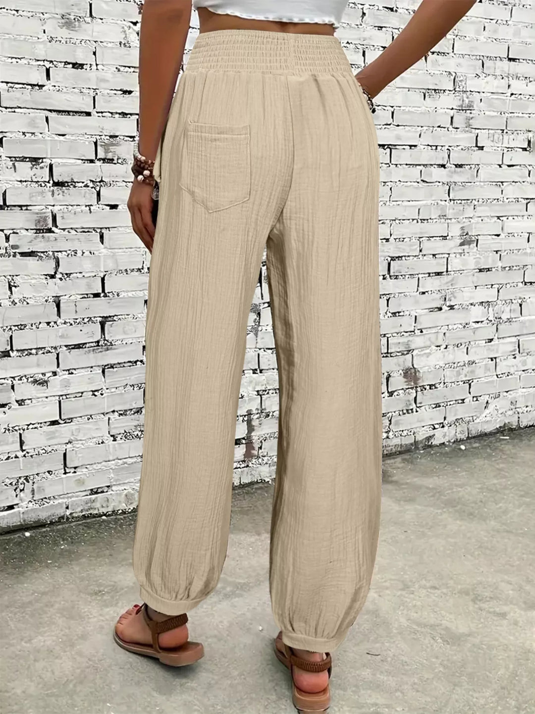 Wide-leg smocked waist casual pants in textured weave