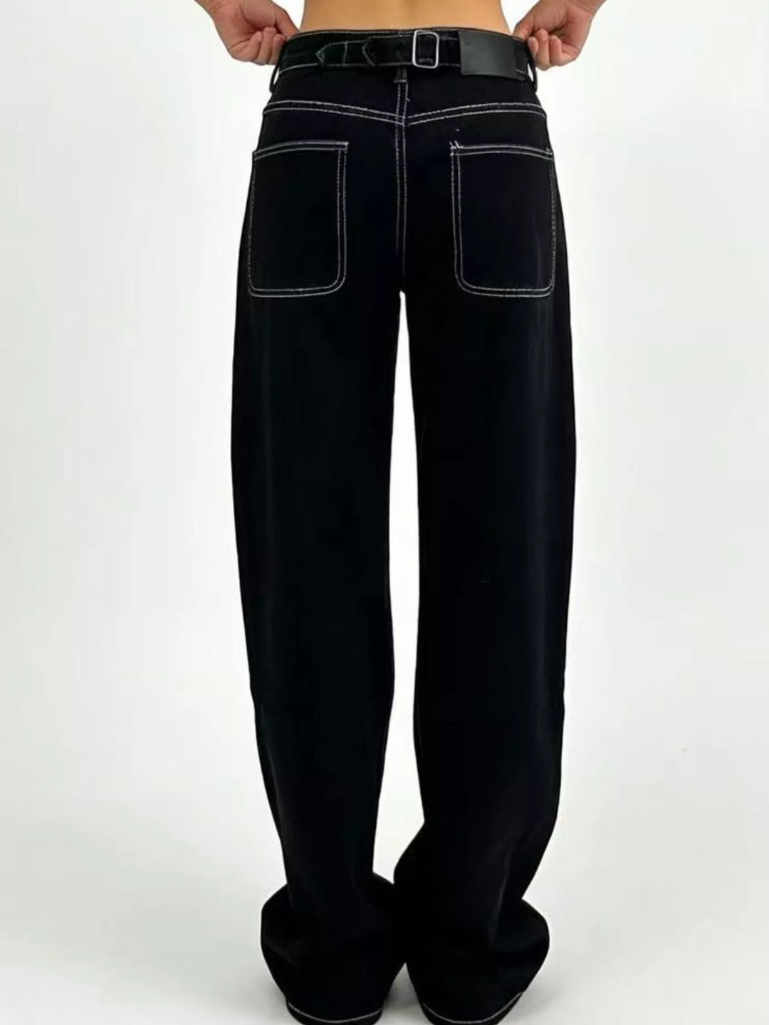 High-rise wide-leg jeans in faded mid-wash denim