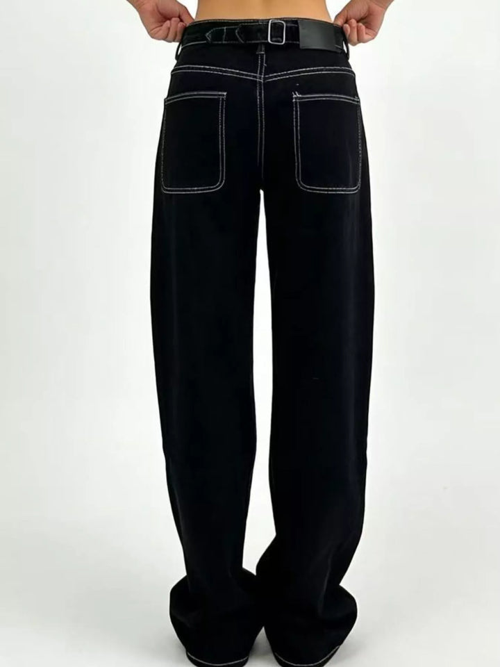 High-rise wide-leg jeans in faded mid-wash denim