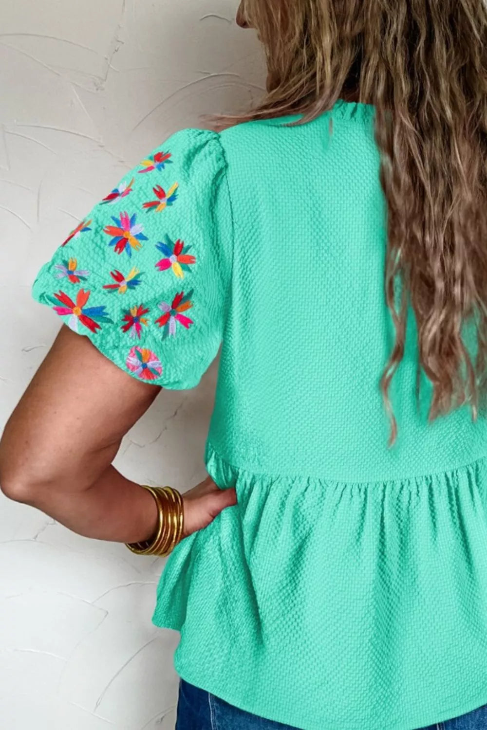 Floral embroidered puff sleeve peplum blouse