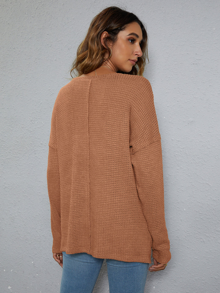 Dropped-shoulder waffle-knit V-neck top with high-low hem