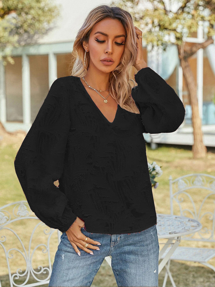 Textured v-neck blouse with balloon sleeves