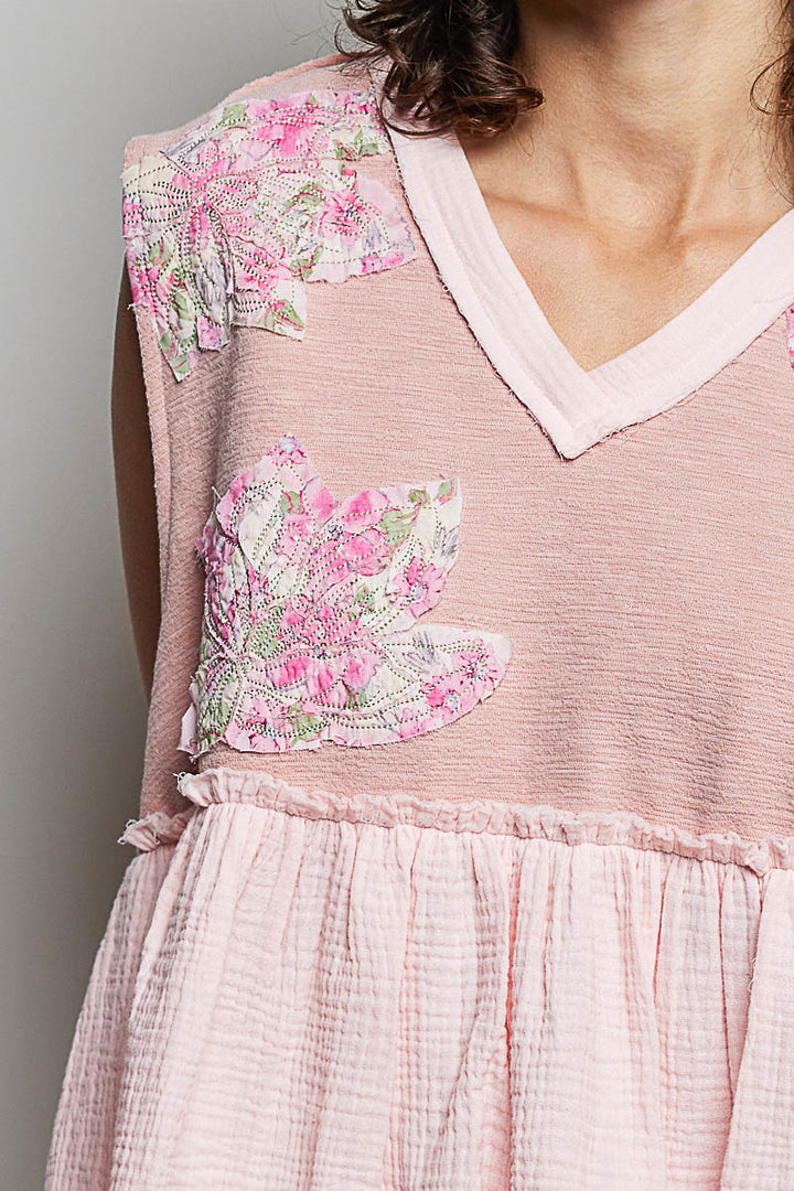 Floral patch V-neck sleeveless top with ruffle hem and raw-edge detail