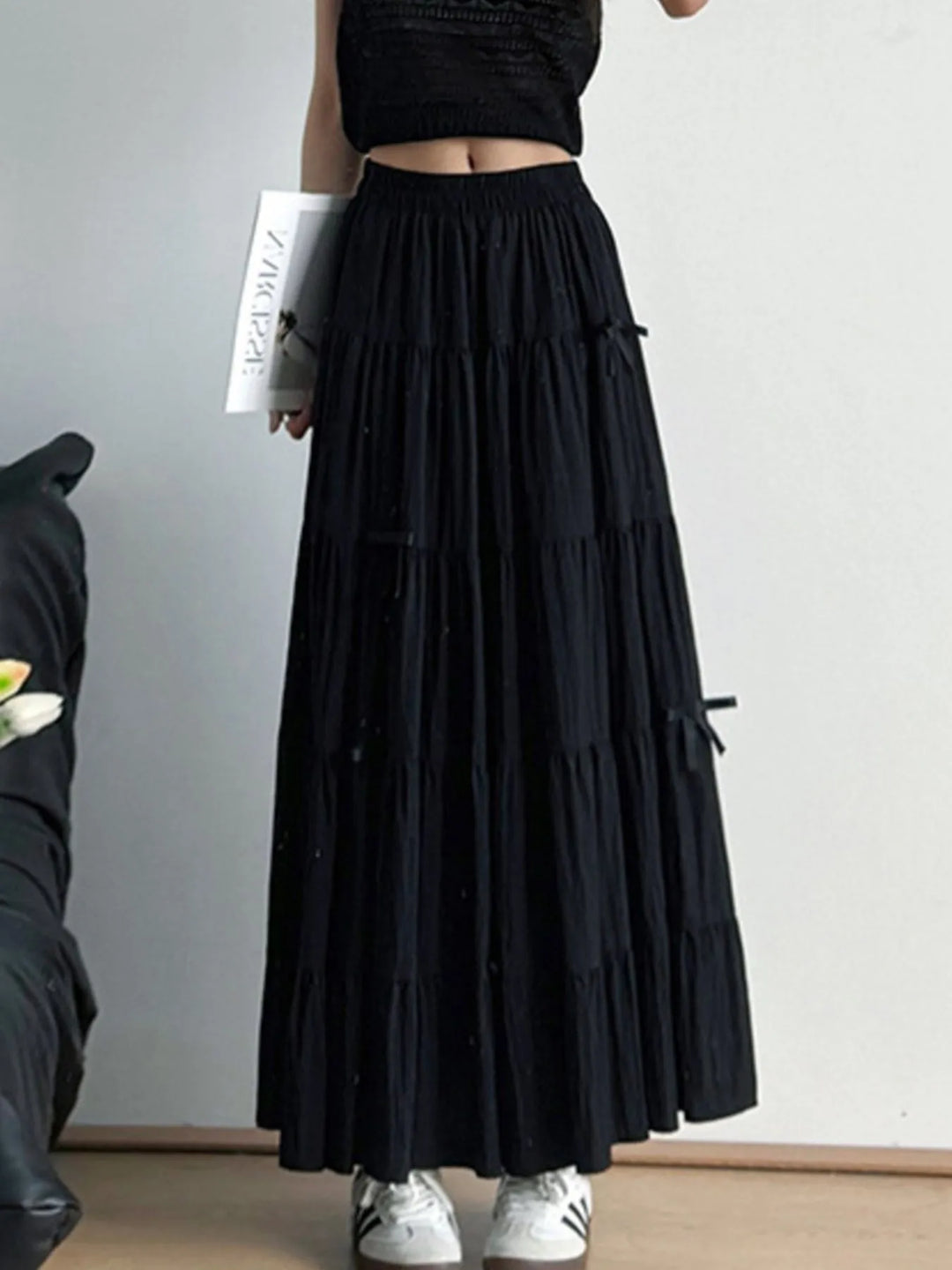 Tiered bow-accent maxi skirt with elastic smocked waist