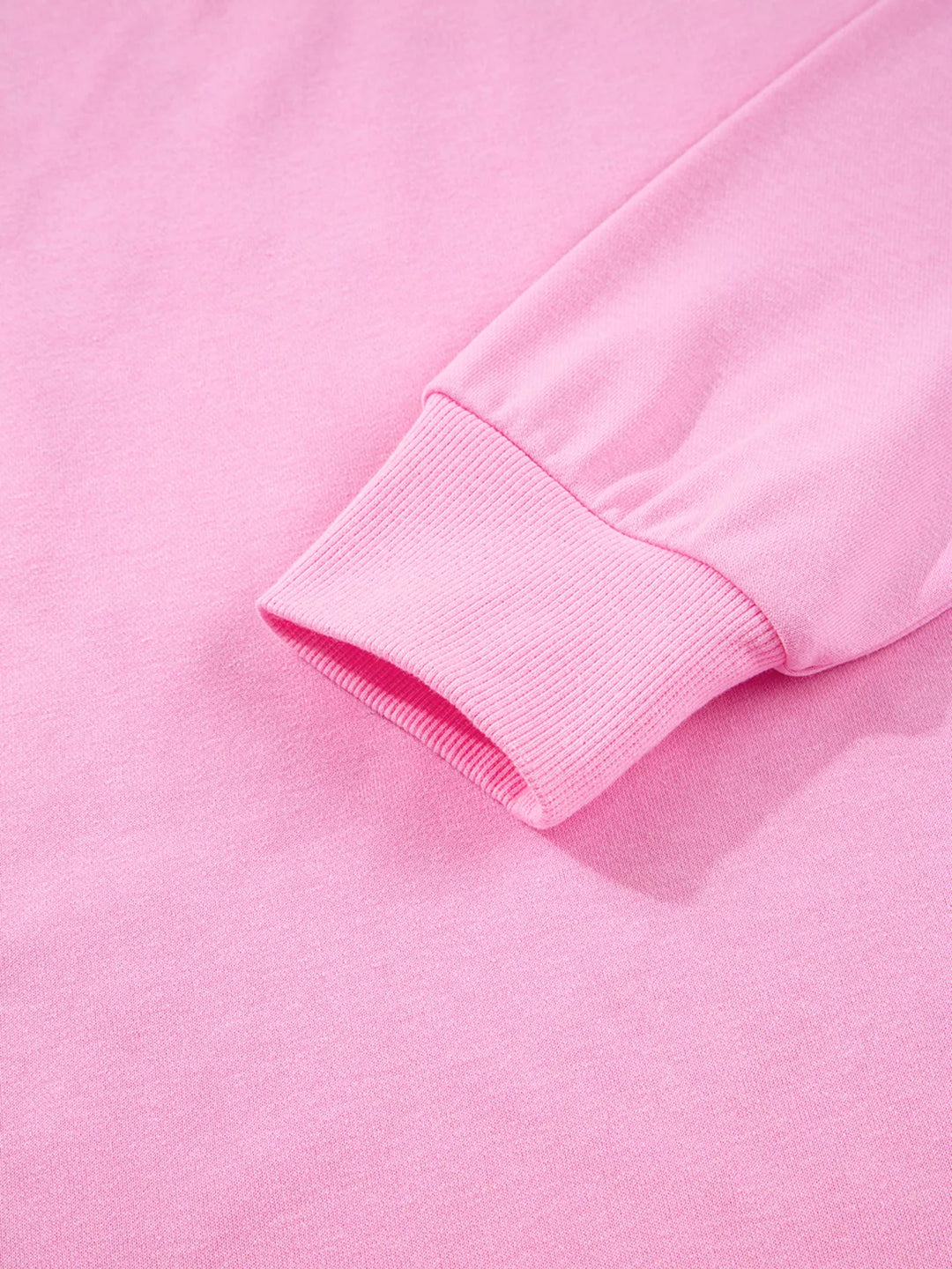 Oversized XOXO graphic sweatshirt with exposed seams and bows