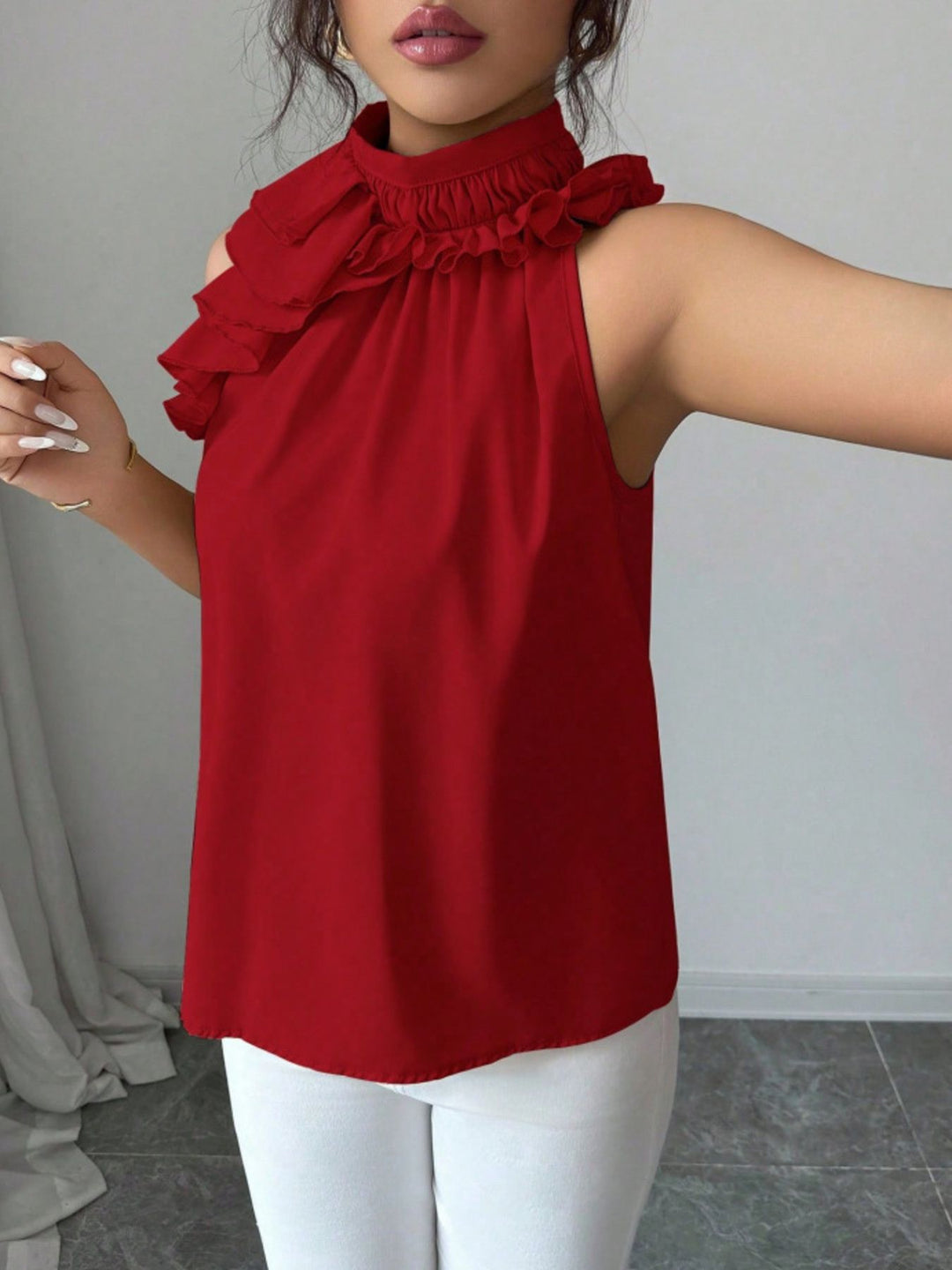 Flowy ruffle-trim high-neck sleeveless blouse