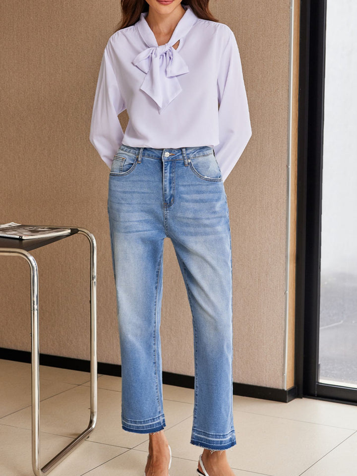 High-rise whiskered wash raw hem cropped jeans