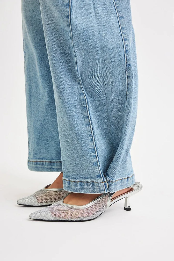Mid-rise wide barrel jeans with adjustable snap hem